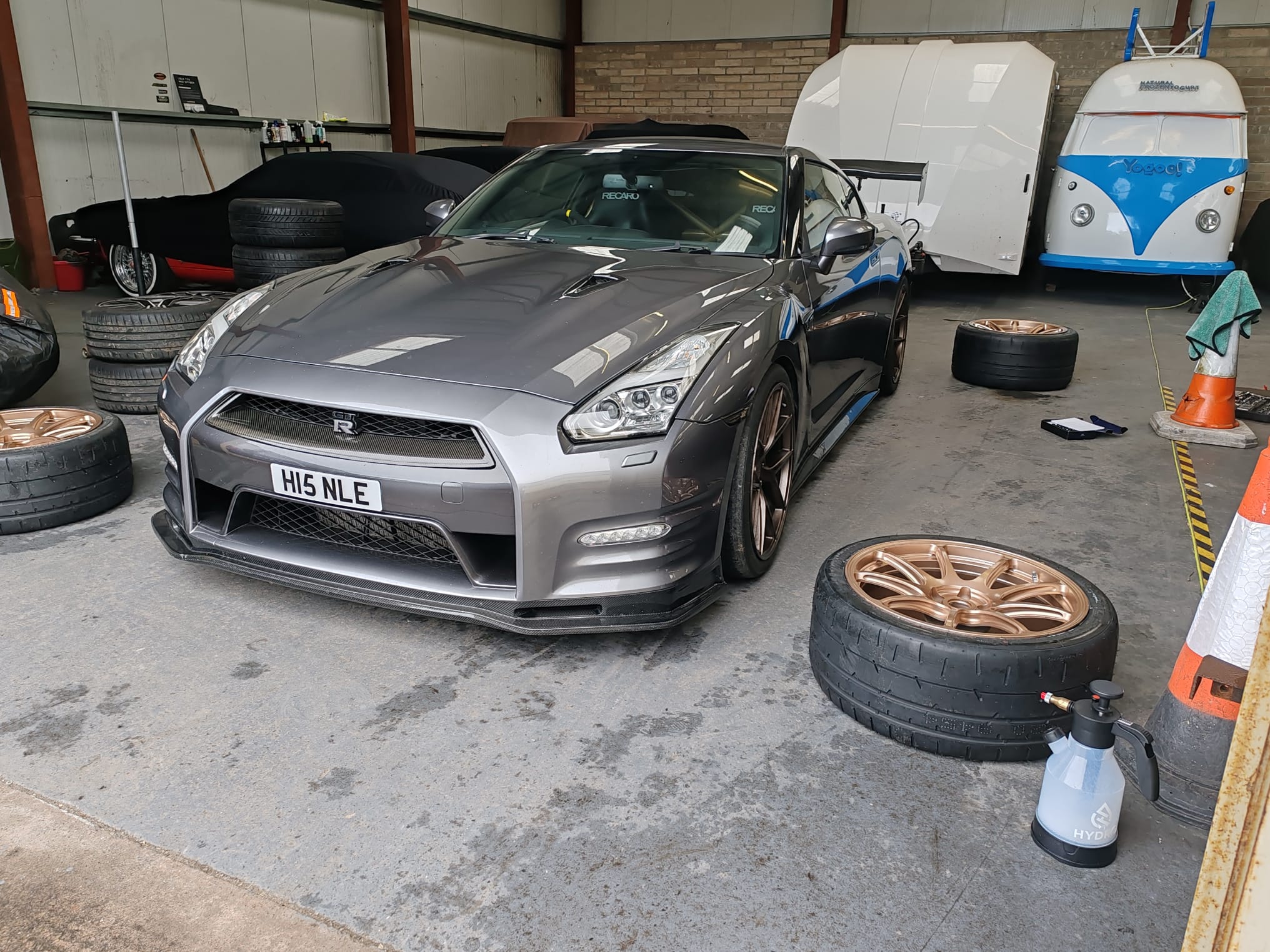 GT-R motorsport tyre fitting in workshop